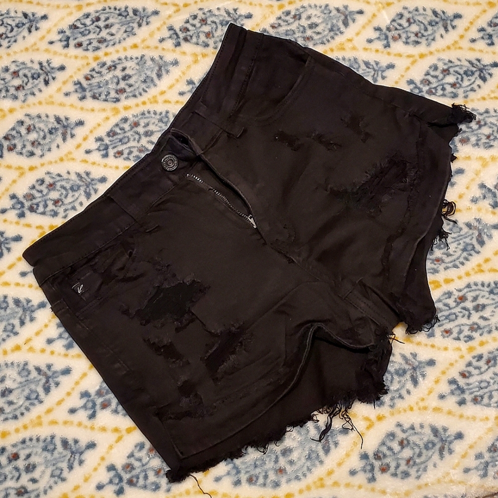 Black Kancan Jean Shorts size 7/27 with frayed edges and distressing